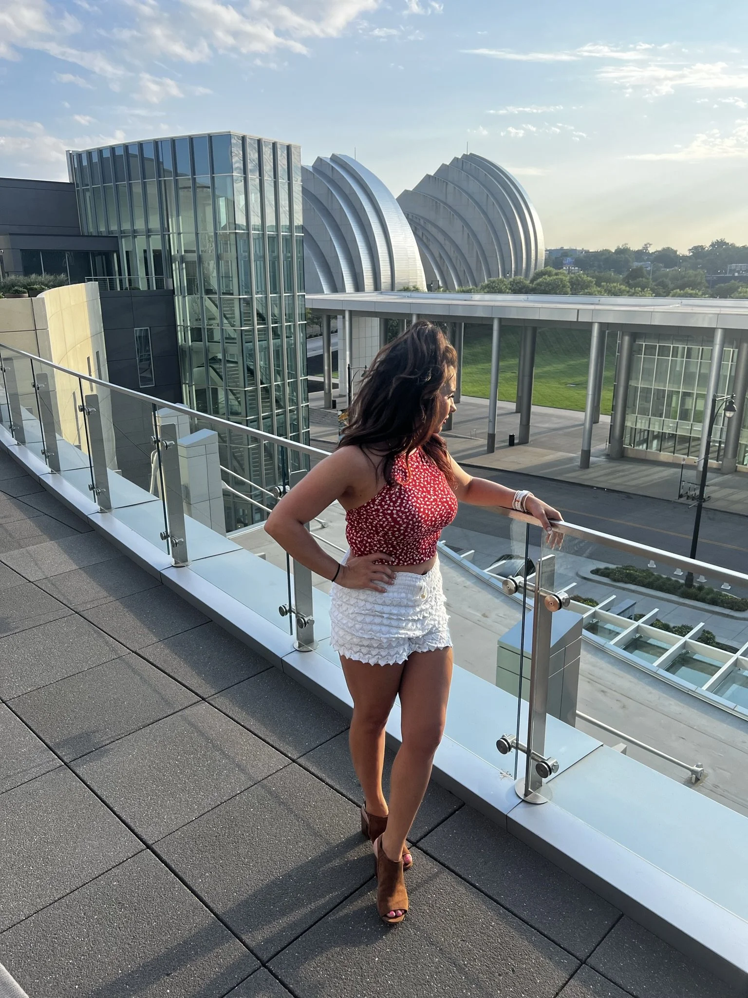 Women standing confidently at sunset symbolizing growth, independence, and confidence coaching for women.