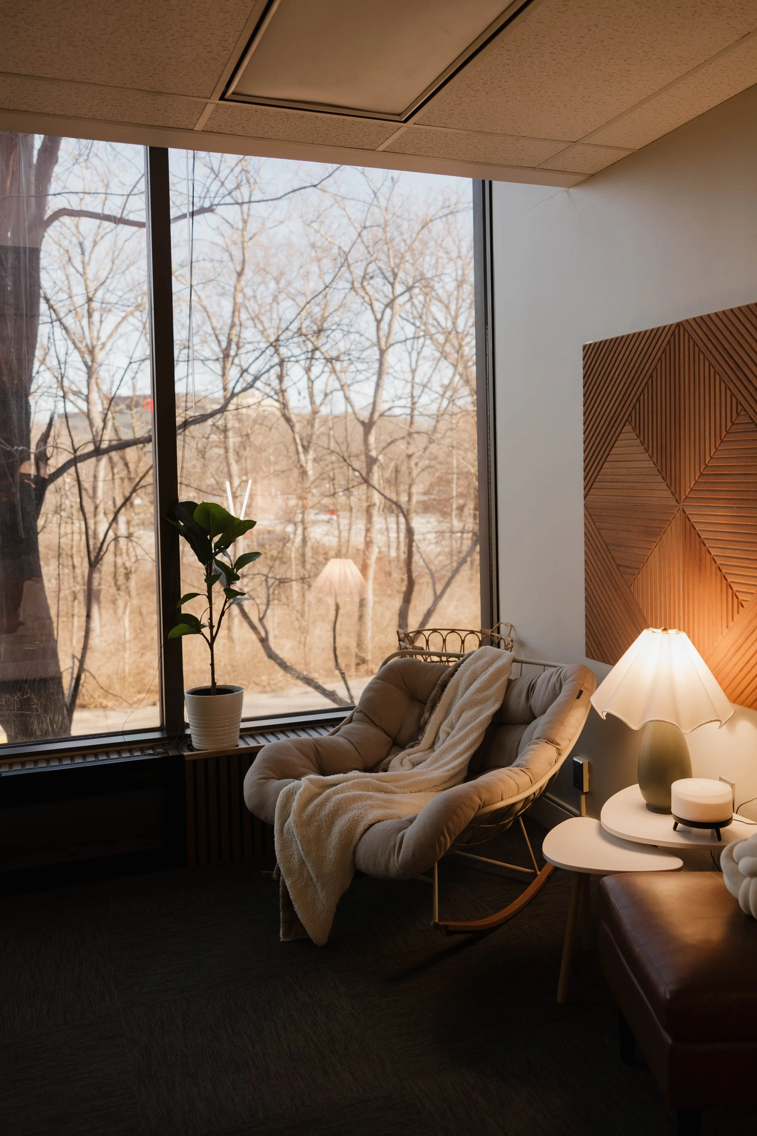 Calm, cozy space representing emotional safety, reflection, and confidence coaching for women.