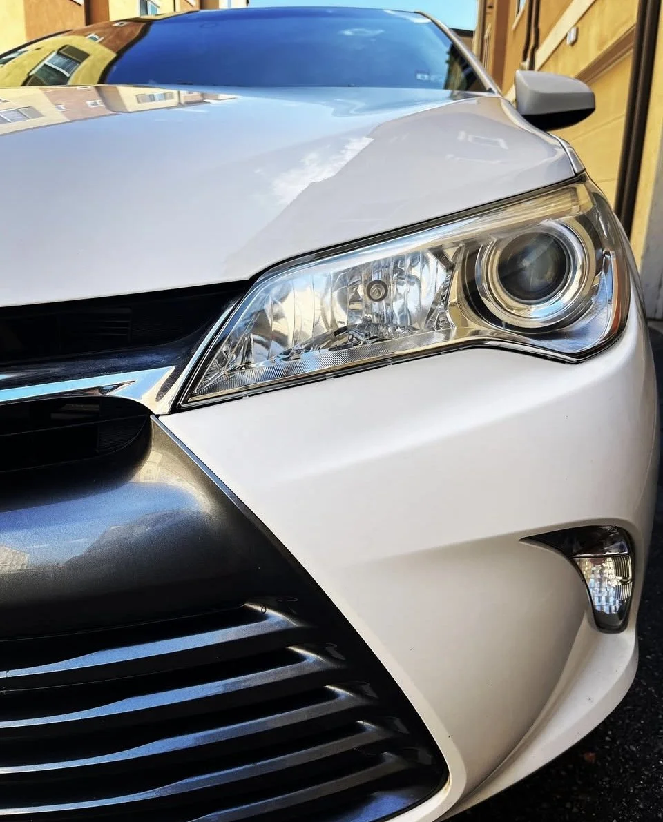 After headlight restoration results displaying crystal clear headlights with restored transparency and improved visibility following professional mobile detailing service