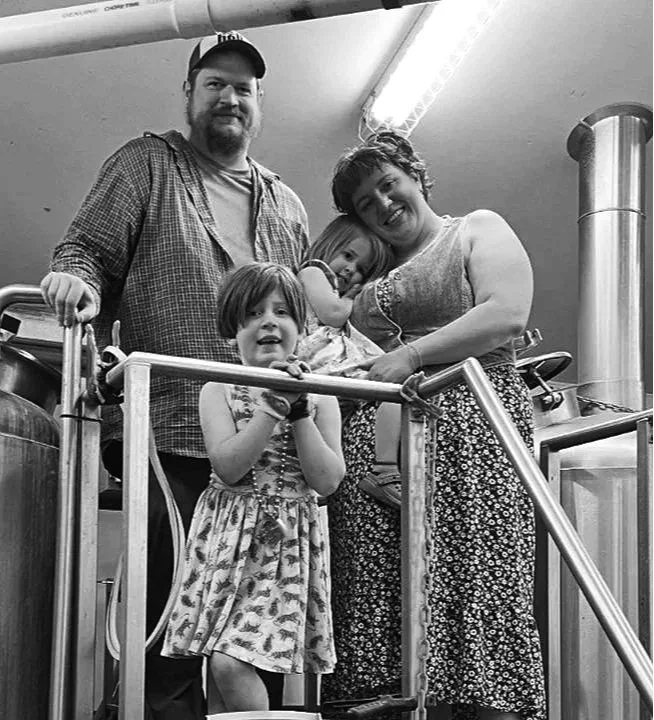 Palmer Brewing founders and family in the brewhouse