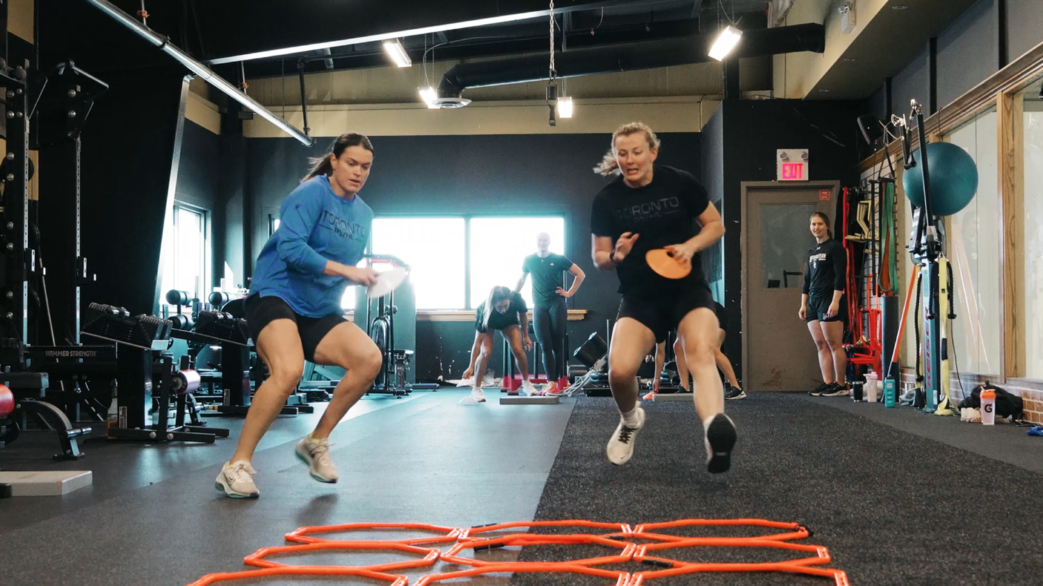 Athletes working through agility drills at SHIELD