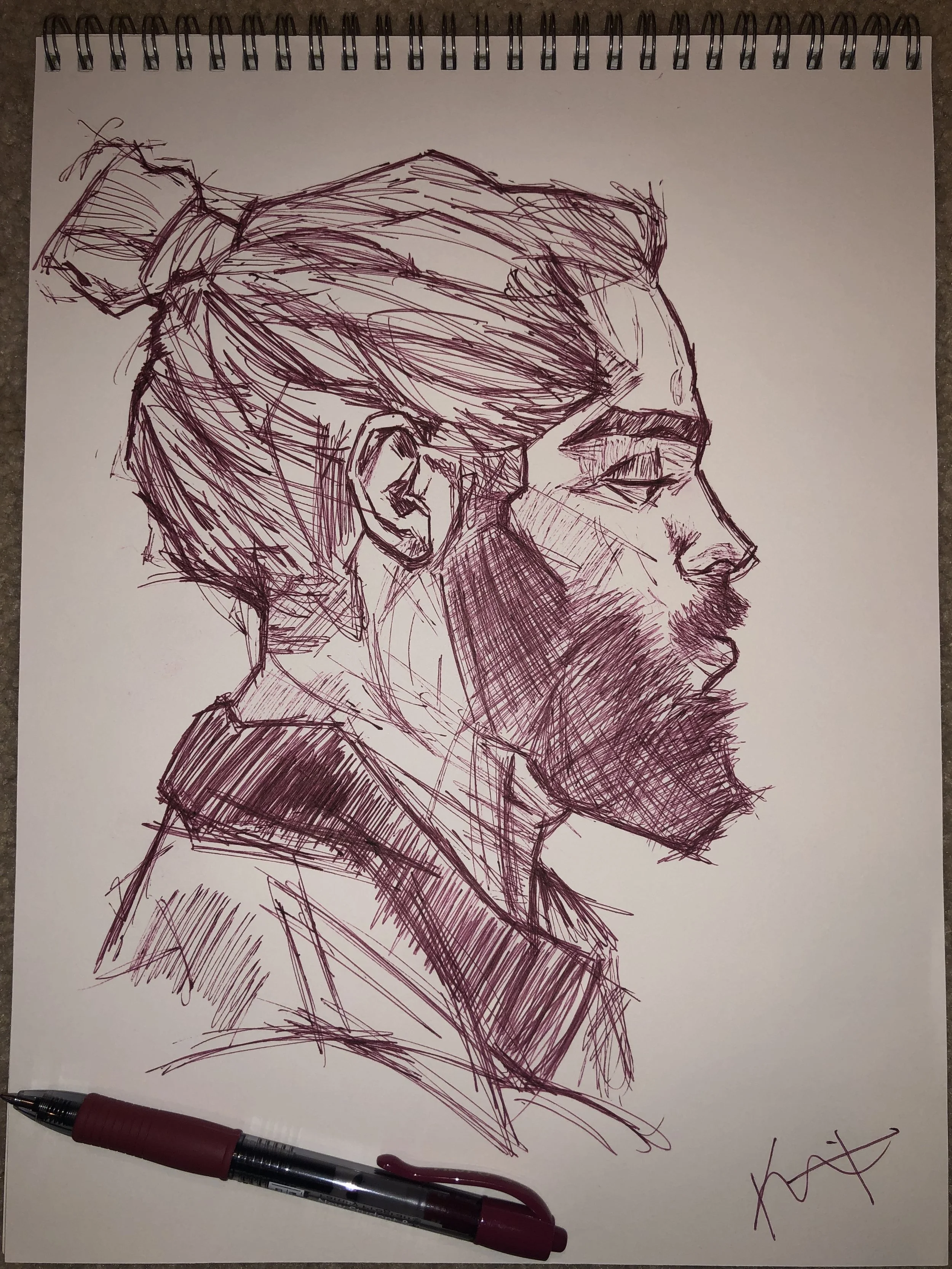 An ink sketch of the side profile of a man.