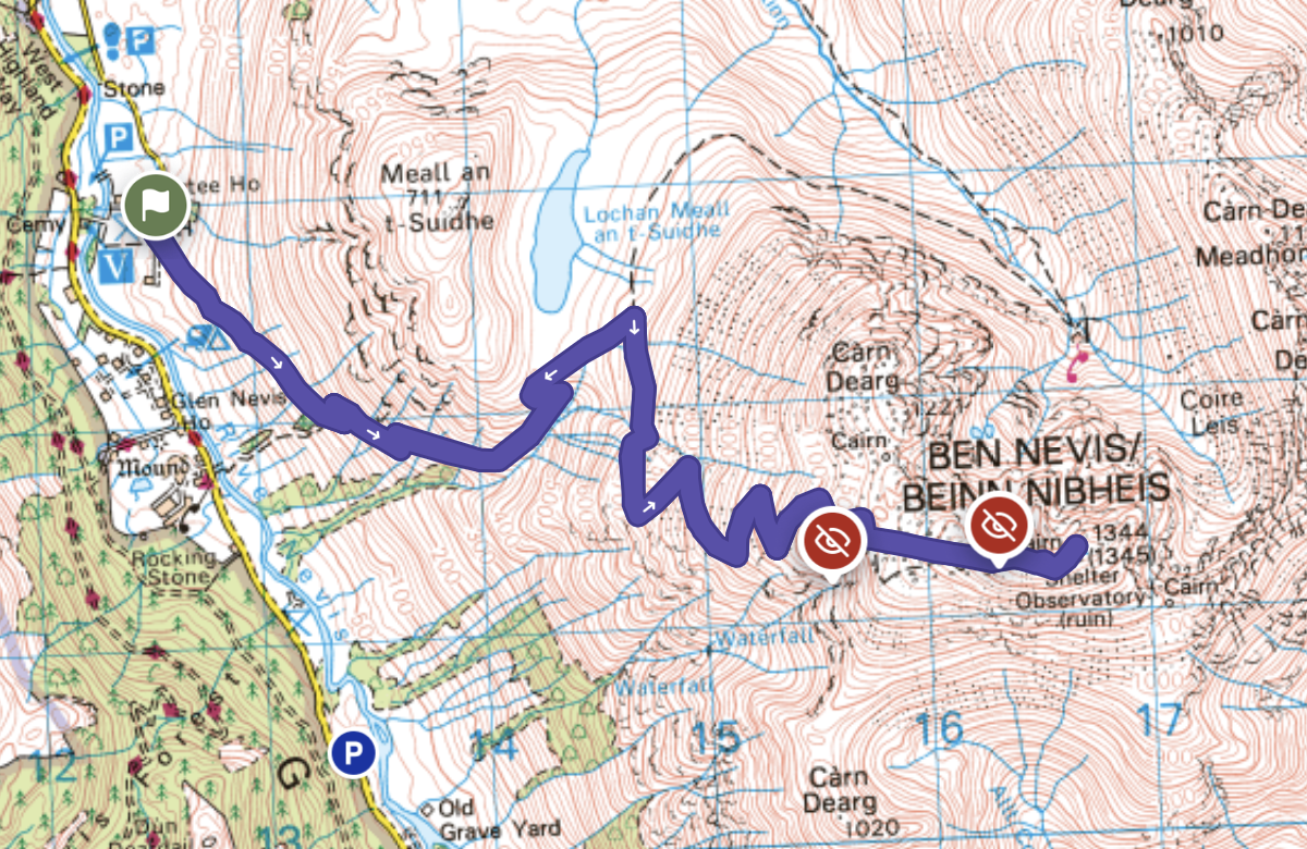 Topographical map of Ben Nevis/Beinn Nibheis mountain with a marked hiking trail in blue, starting from a parking area near the town, passing through natural features like waterfalls, and reaching the summit.