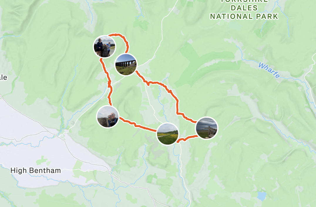 Map with a highlighted trail in the Snowdonia National Park, Wales, showing five photos along the trail, including scenic views, people, and a bridge.