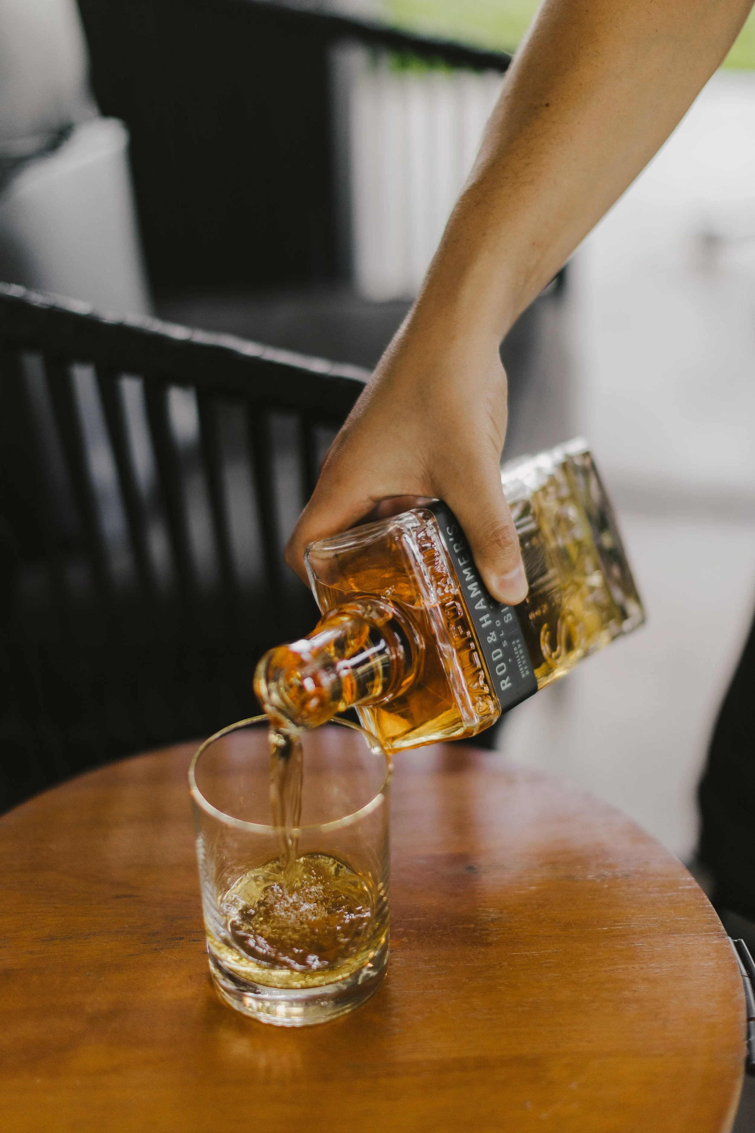 Complimentary whiskey from Rod & Hammer for the groom 