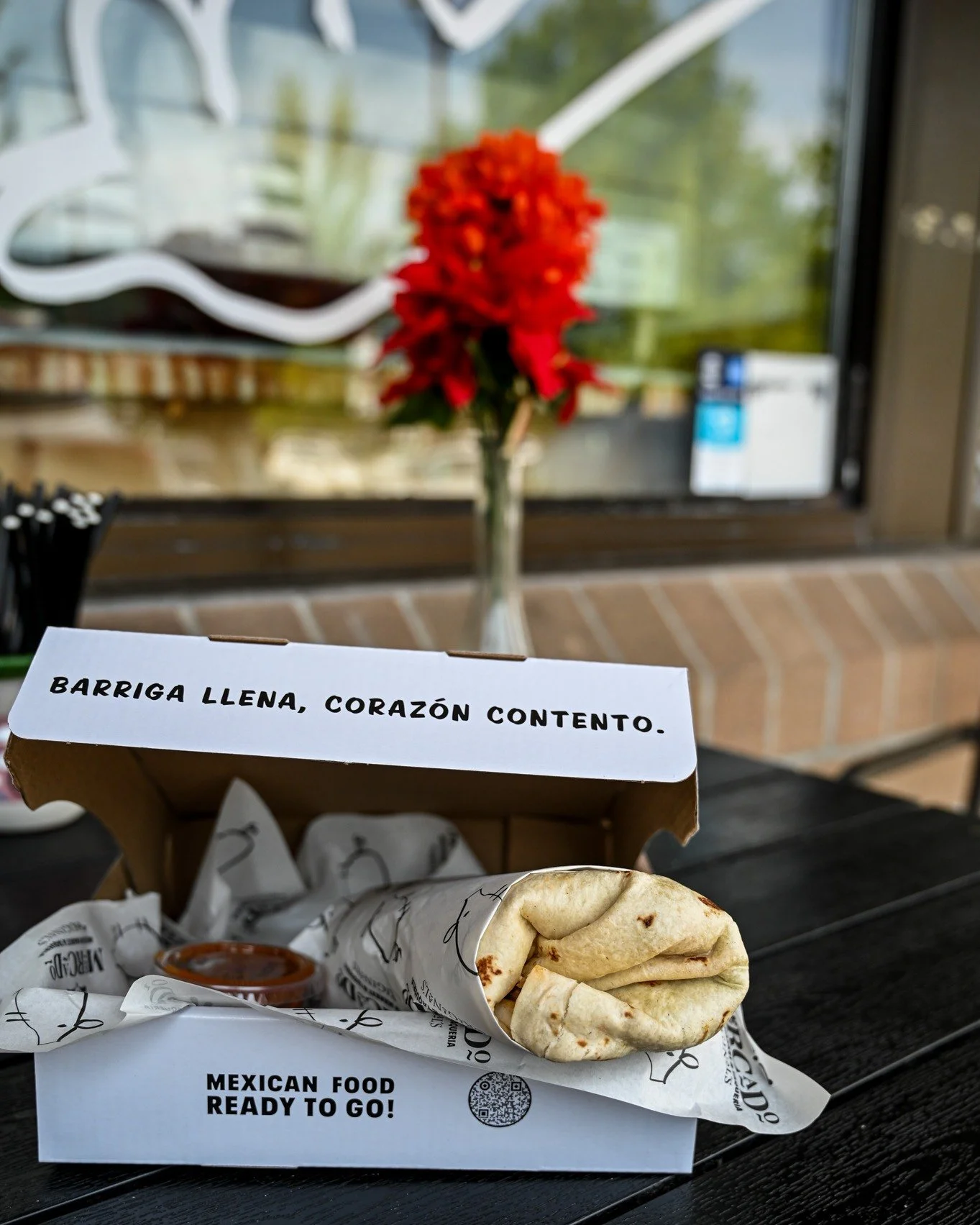 "Barriga llena, coraz&oacute;n contento." We put it right on the box for a reason. 🌯❤️
This old Mexican saying &mdash; full belly, happy heart &mdash; is more than words. It's the whole point.
A hand-rolled burrito, salsa on the side, pack