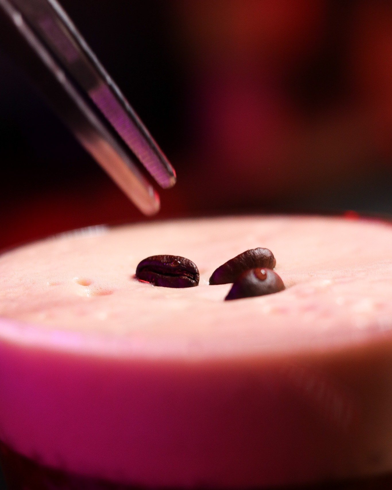 Three coffee beans. Placed by hand. With tweezers. 🫘☕
This is the moment most people miss &mdash; the final detail on a Carajillo before it leaves the barra.
Tradition says the beans represent health, wealth, and happiness. We say they represent the