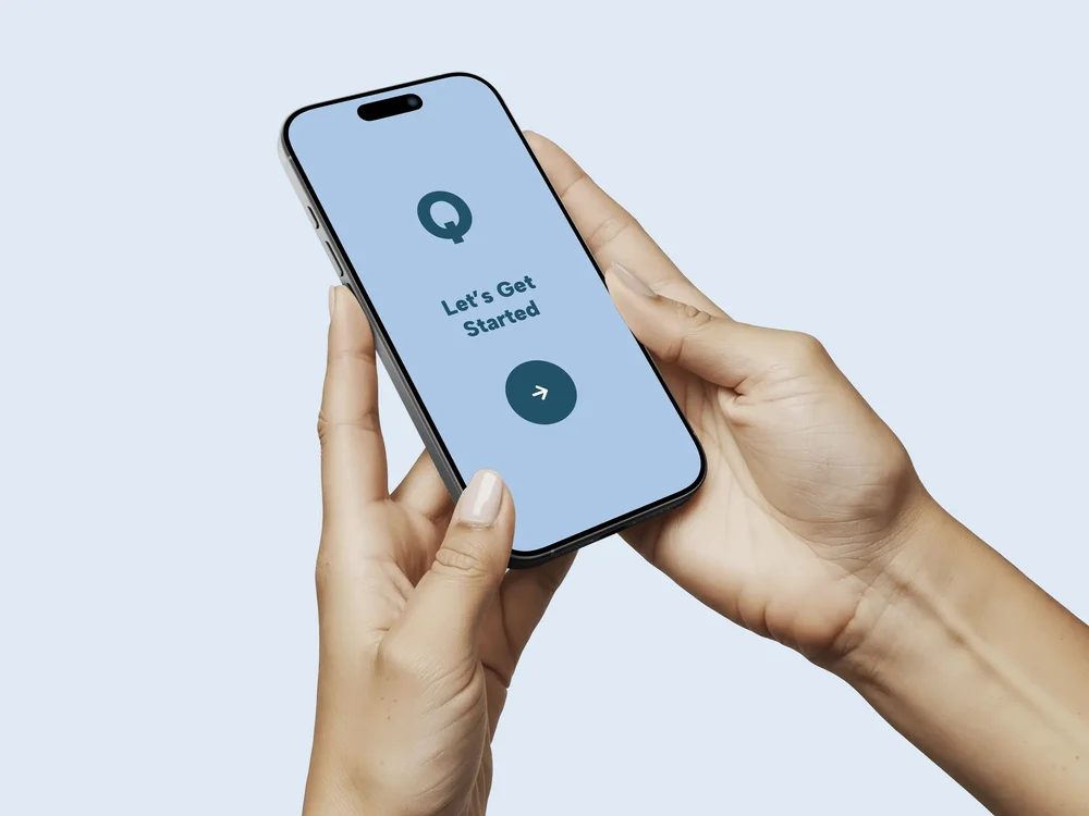 Quiet Cycle’s blue welcome screen displayed on a phone held in two hands