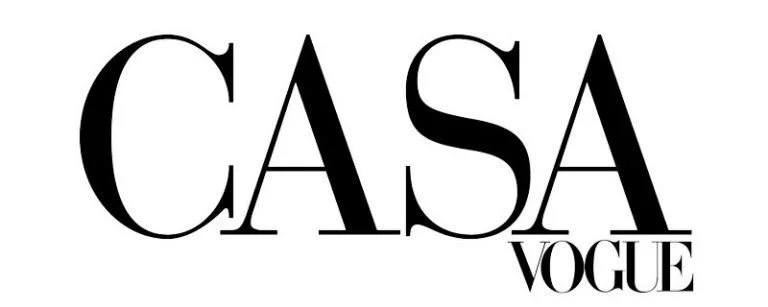 Logotipo com as palavras "CASA VOGUE" em letras grandes e elegantes.