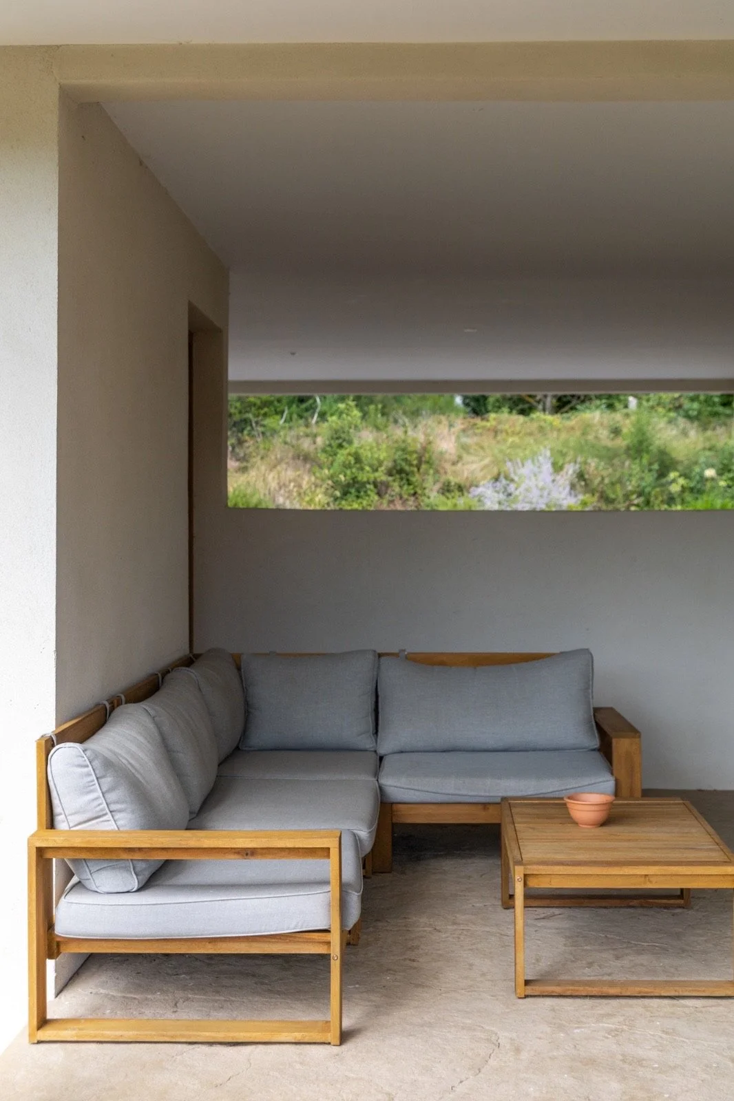 Overdekte lounge van Maison Morrivelle