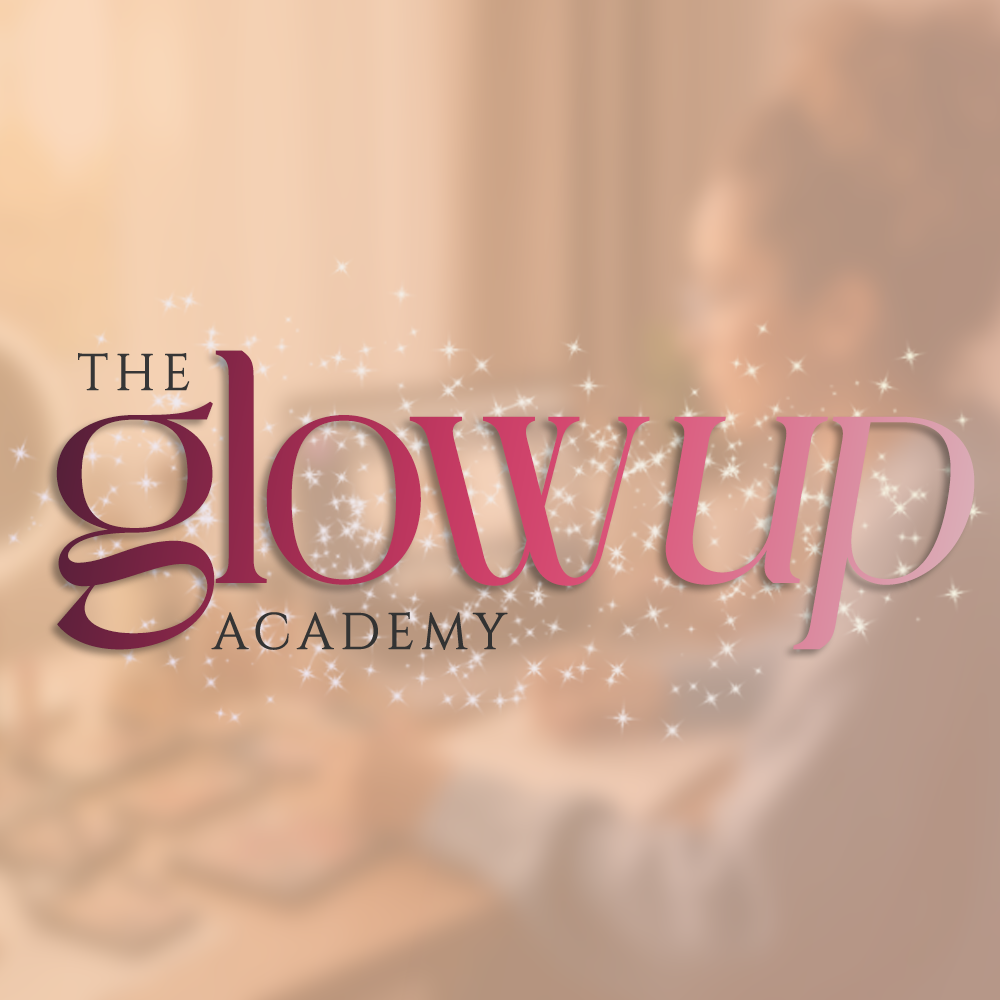 Logo for The Glow Up Academy with a blurred background showing two people facing each other, one holding makeup brushes.