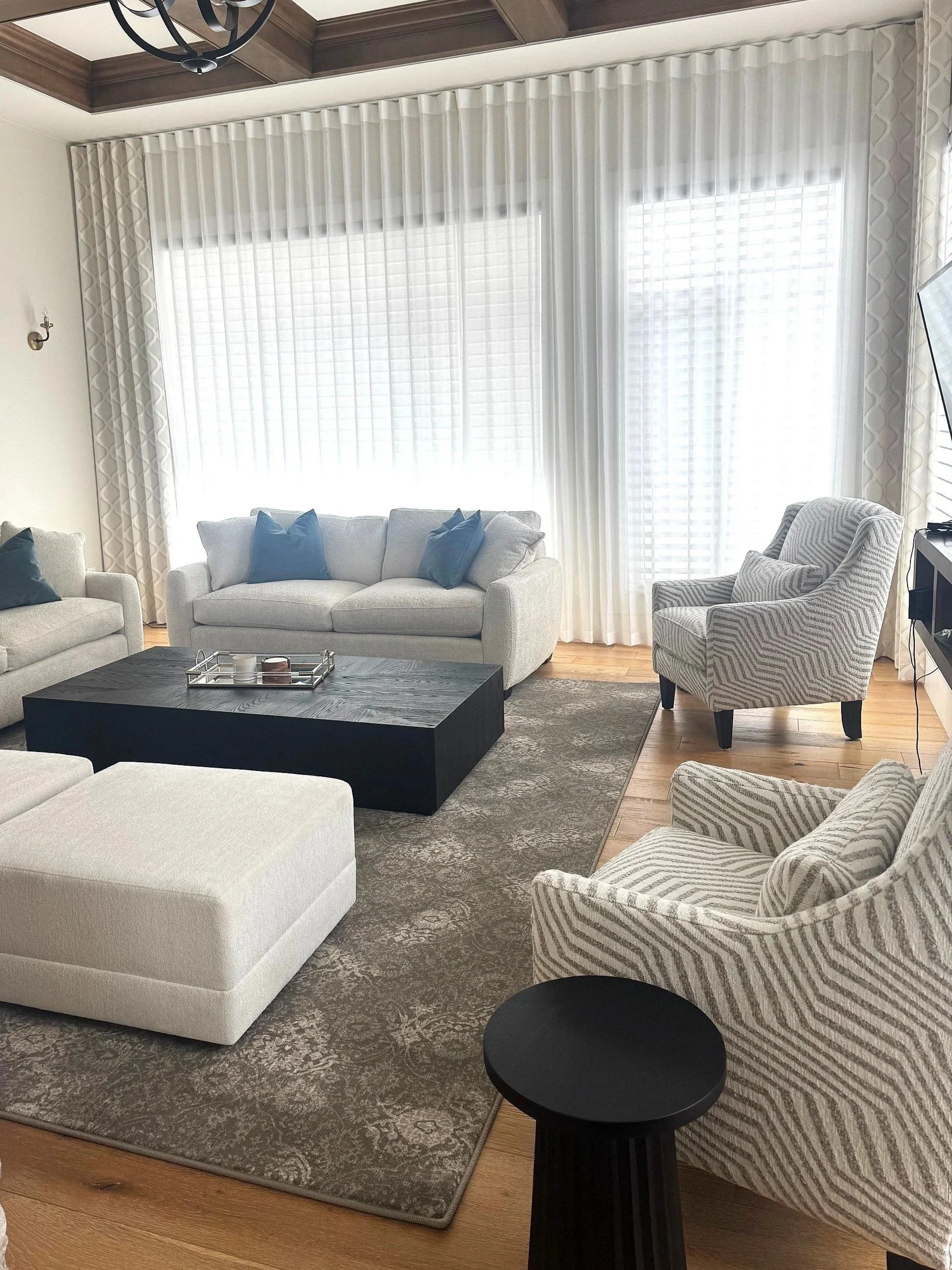 Should I hire an interior designer or decorator? Designers typically handle space planning, renovations, and structural decisions; decorators focus on furnishings and aesthetics within an existing layout.