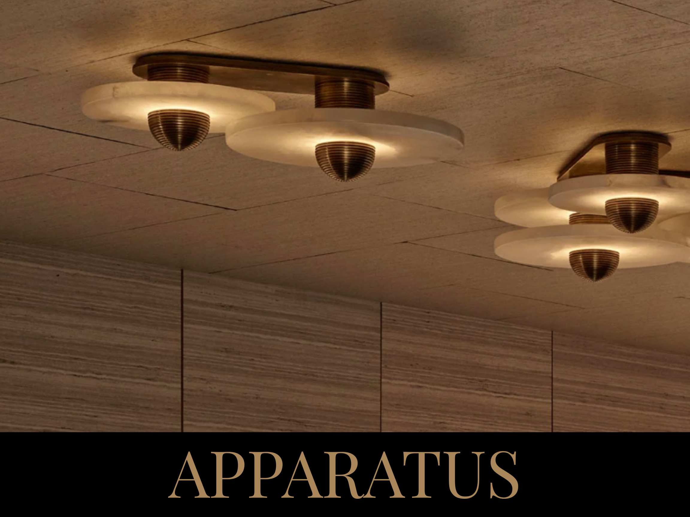 Modern ceiling lights with circular, layered design mounted on a wooden ceiling.