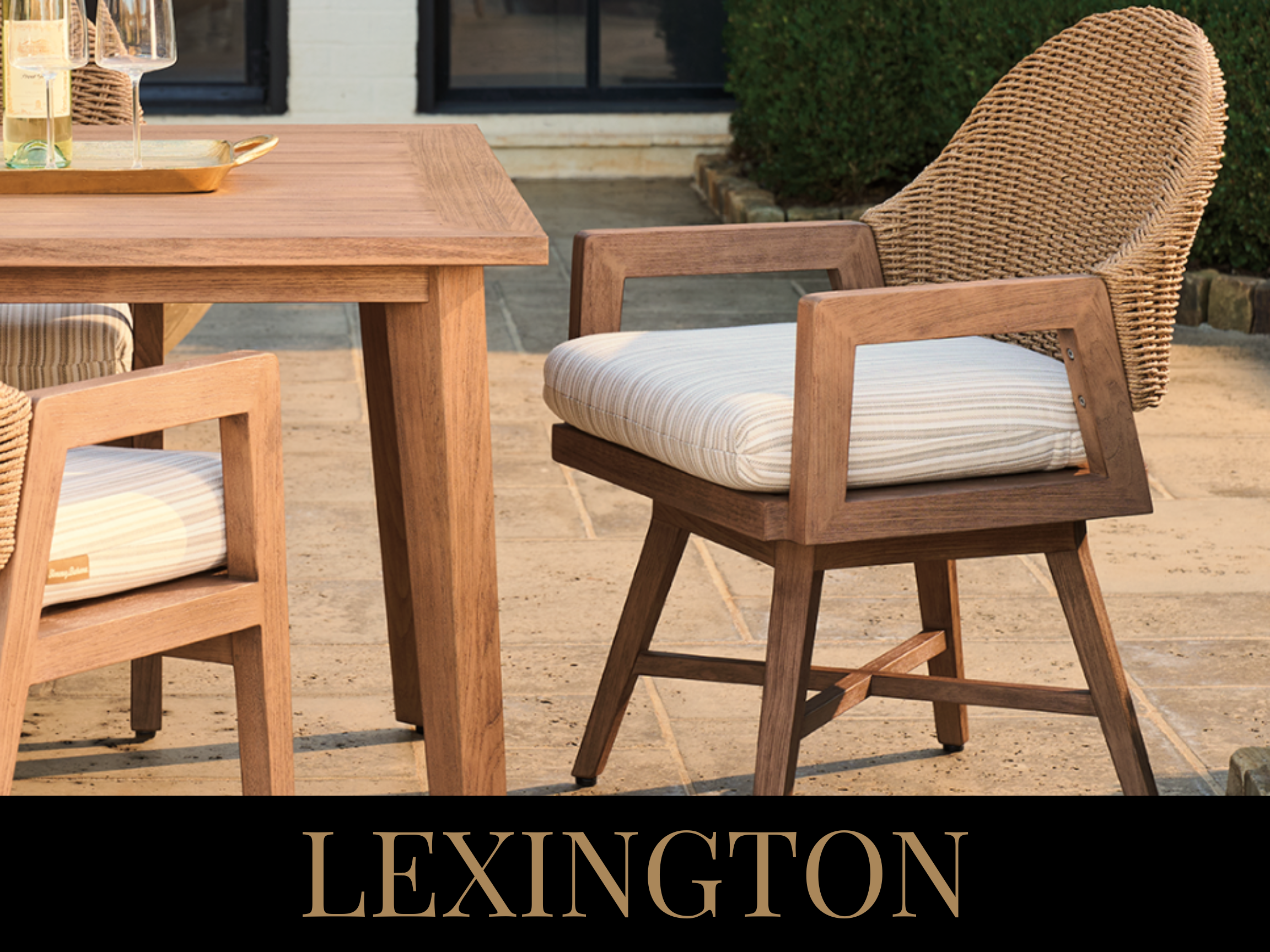 Outdoor patio table and chairs with cushions, with the word 'LEXINGTON' at the bottom.