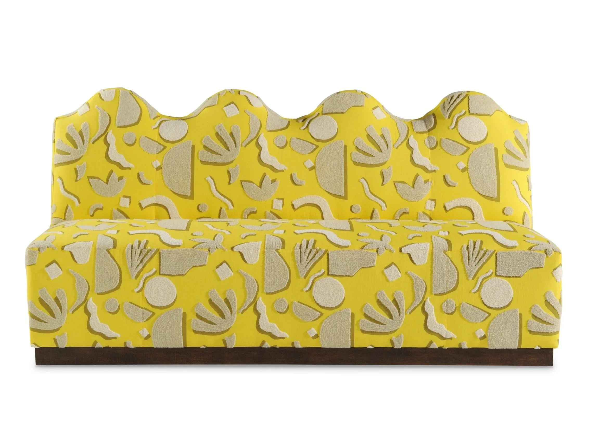 Yellow upholstered sofa with a patterned fabric featuring abstract shapes in beige and white, and a dark wooden base.