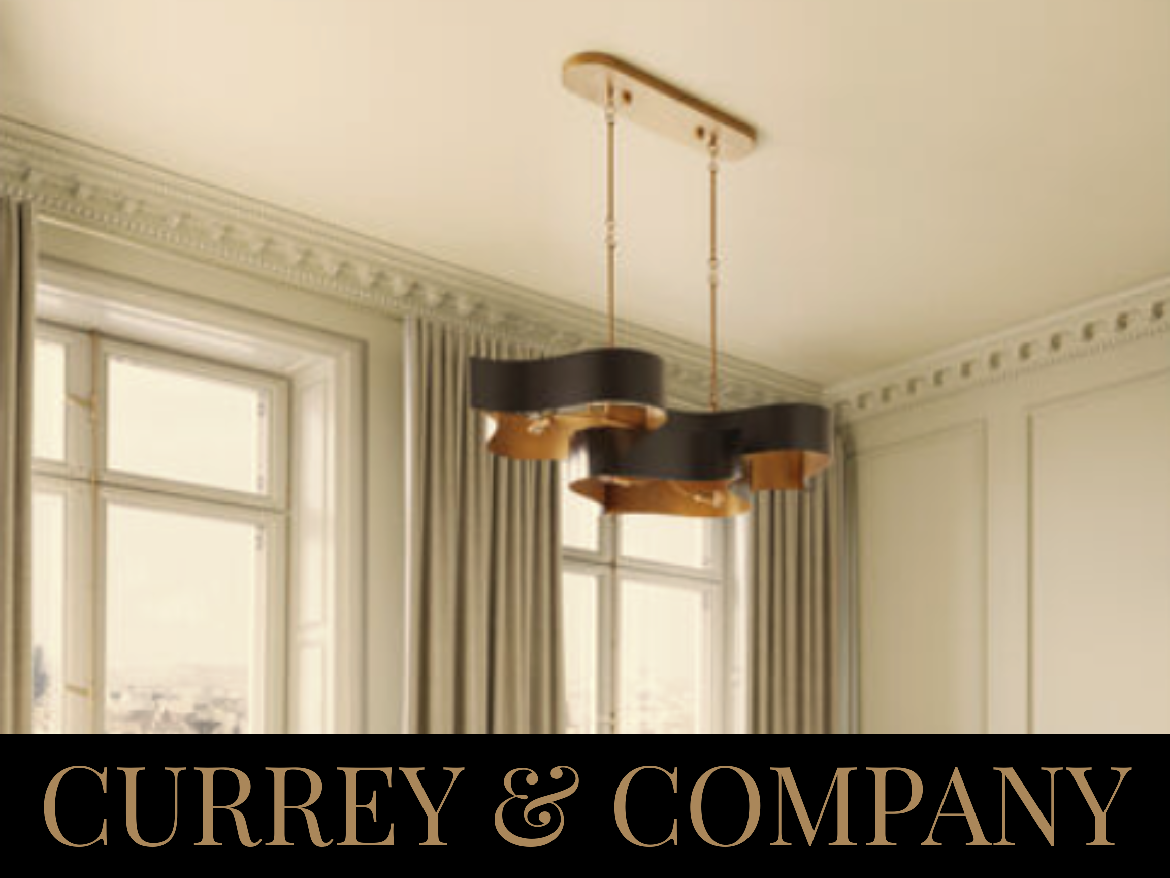 A modern black and gold chandelier hanging from a white ceiling in a room with large windows, curtains, and decorative crown molding.