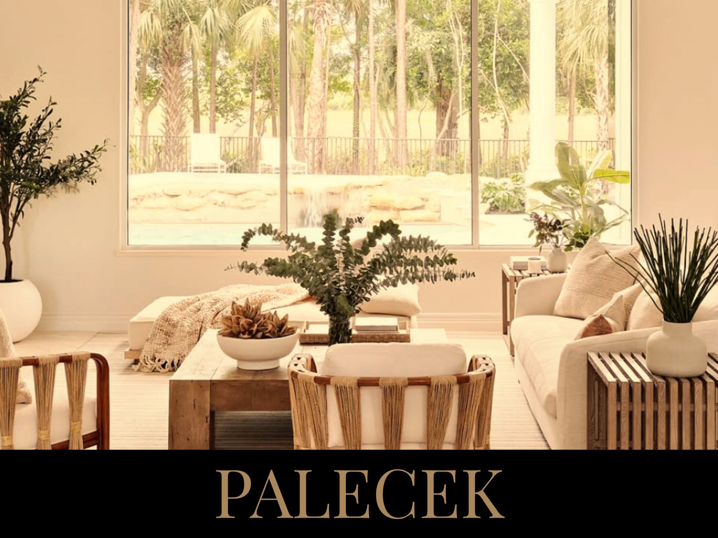 Bright living room with large window overlooking garden, beige sofas, wooden chairs, assorted potted plants, and a black banner with the word 'PALECEK'.