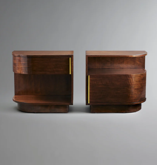 Two vintage wooden nightstands with curved fronts and gold accents on a gray background.