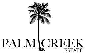 Palm tree with the text 'Palm Creek Estate' beneath it.