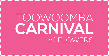 Pink banner with white text reading 'Toowoomba Carnival of Flowers'
