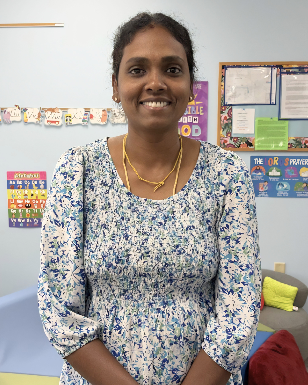 Ms. Girija Pandian, Mothers' Day Out Teacher Aide at Redeemer Lutheran Preschool, in her classroom.