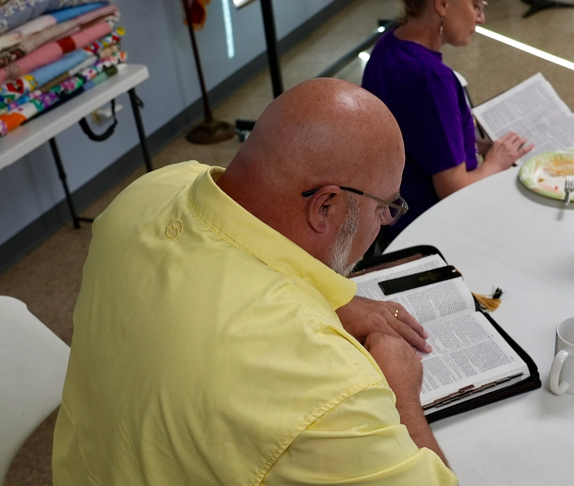Members of Redeemer Lutheran Church’s Monday Bible Study class engaged in reading and discussion, deepening their understanding of Scripture in a welcoming and faith-filled environment.