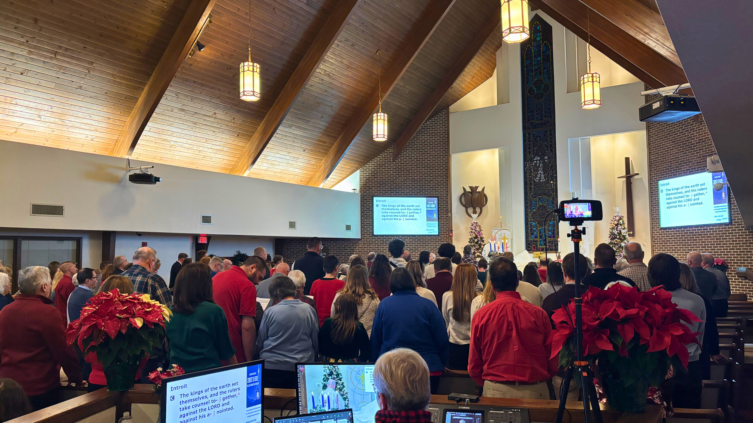 Pastor Kahle preaching during Redeemer Lutheran Church’s Christmas service, sharing the message of Christ’s birth with the congregation.