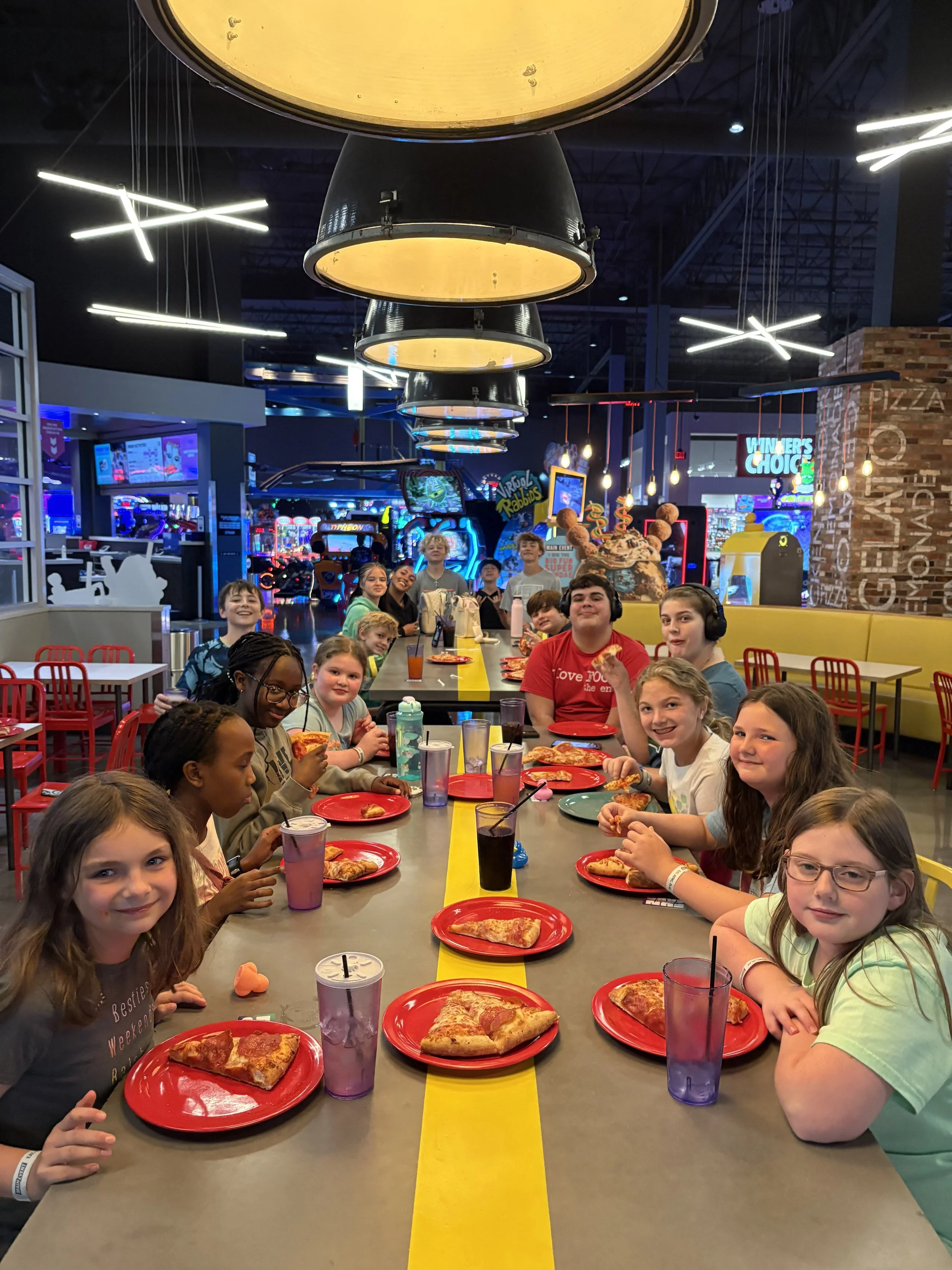 Redeemer Lutheran Church youth ministry students enjoying Main Event in the Greater Kansas City area during a church appreciation celebration.