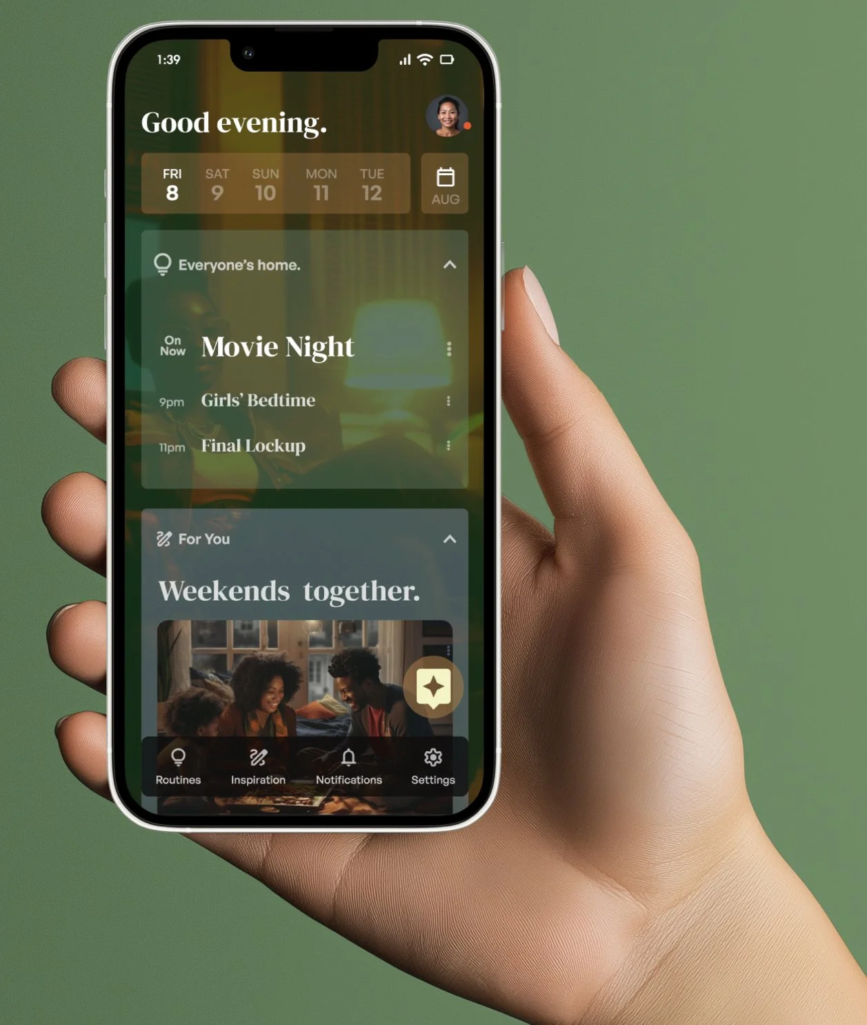 Hand holding phone displaying the Hearth mobile app Home Screen