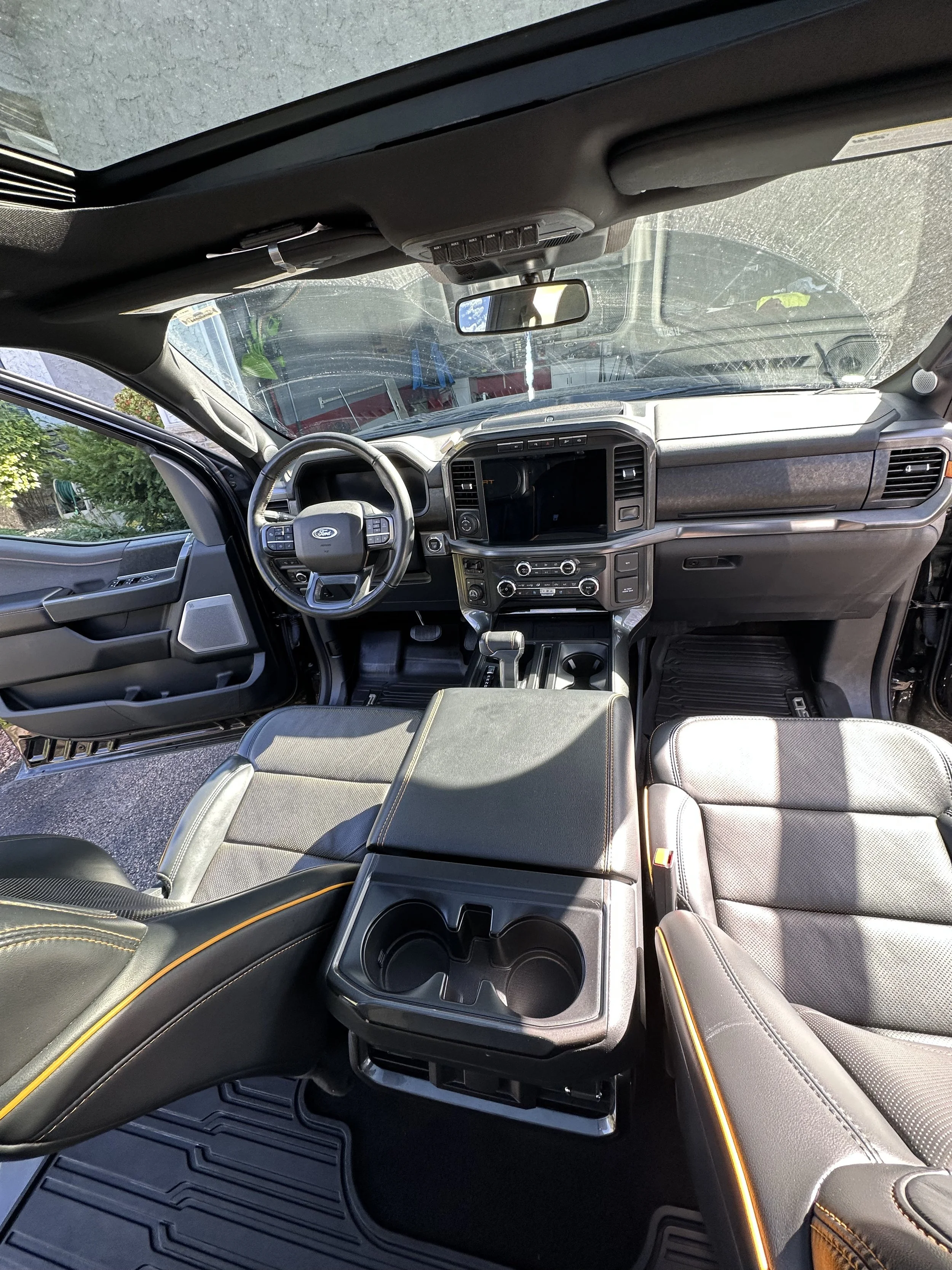 Deep-cleaned Ford Tremor interior featuring refreshed leather seats, detailed center console, spotless dash, and crystal-clear windows. Premium interior detailing service in Minnesota for trucks and daily drivers.