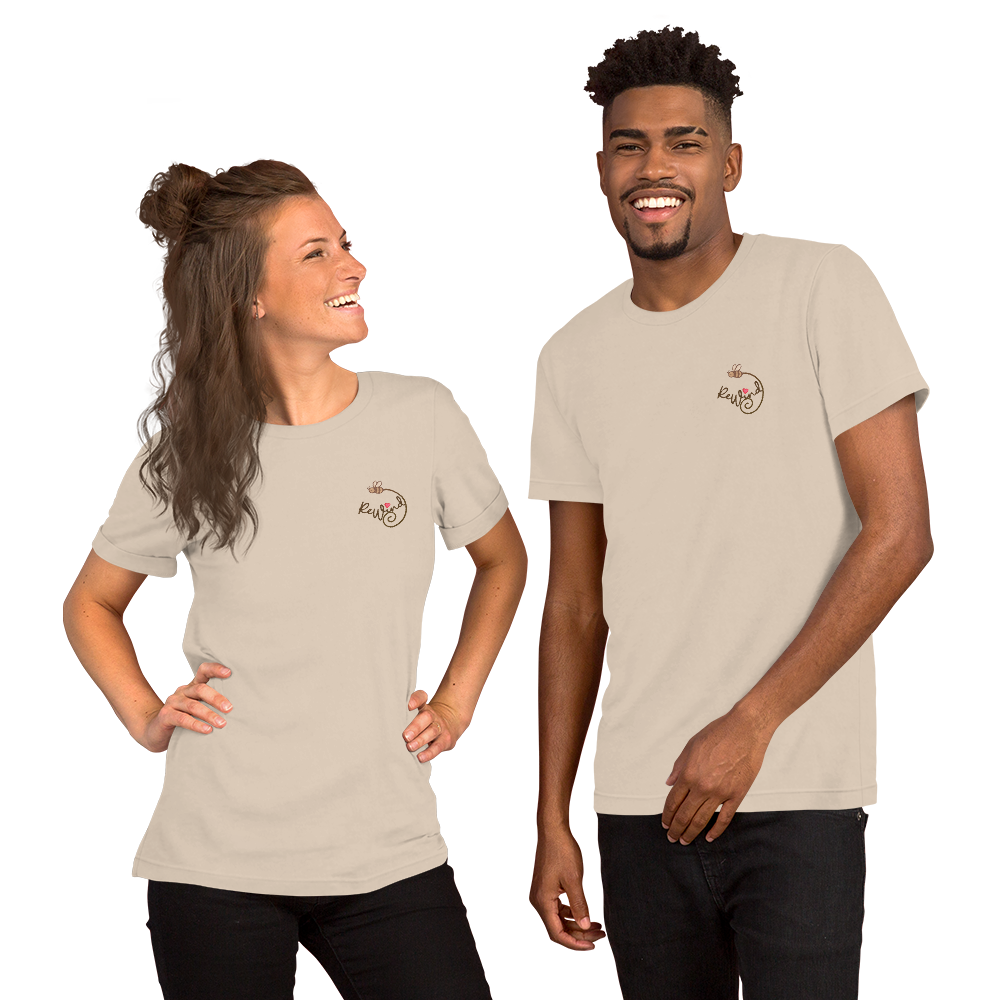 Unisex t-shirt, soft cream, two models front view — front with ReWind bee-and-heart logo and back with “Kindness” text (heart over the i).