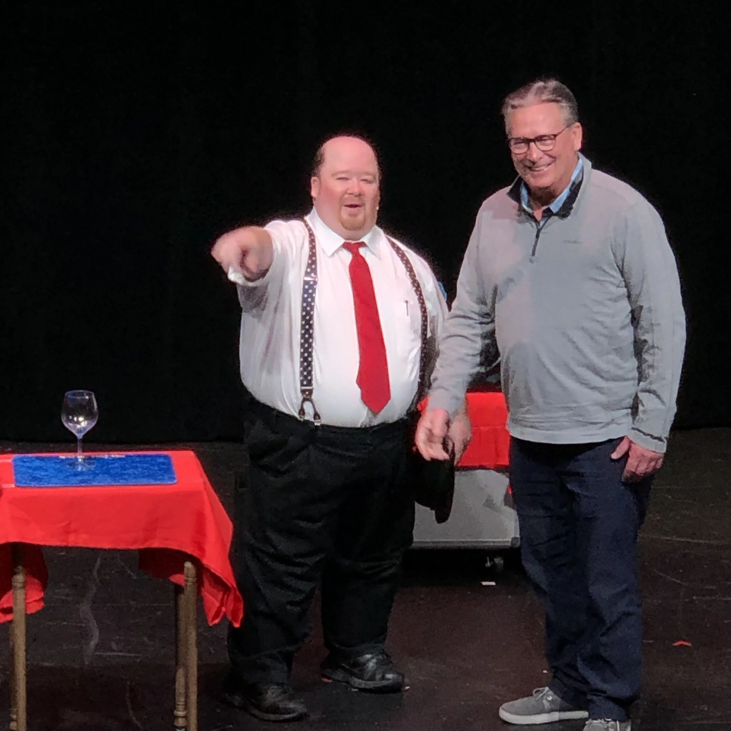 Sir Pat-trick assisting audience member during live performance