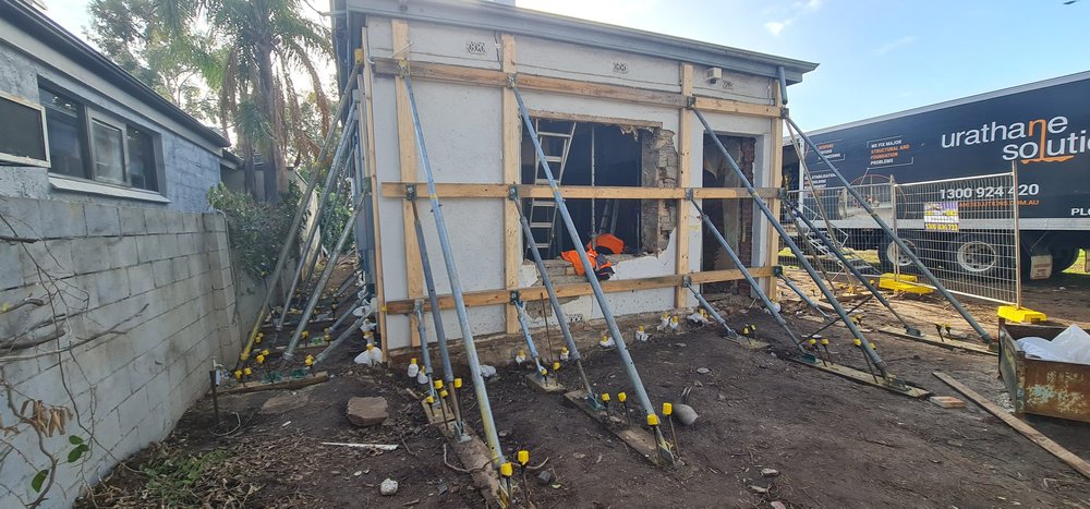 Wall bracing in place before heritage footing stabilisation in St Peters