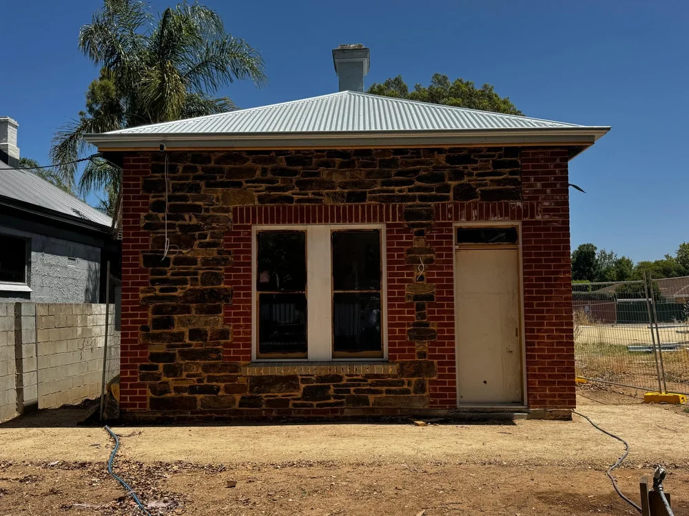 Heritage stone building in St Peters after soil stabilisation and realignment