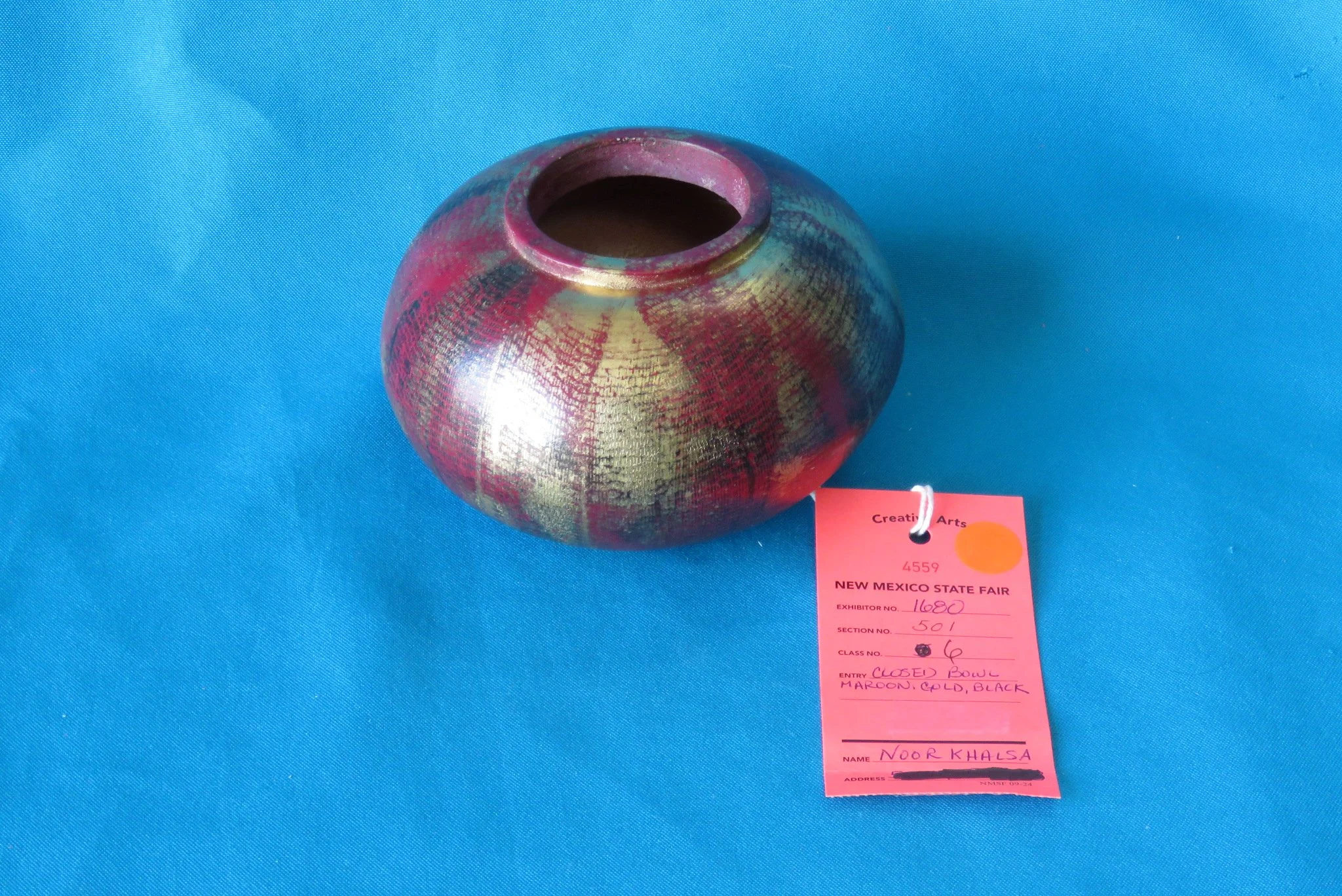 Noor Khalsa
Closed bowl-Maroon, gold, black