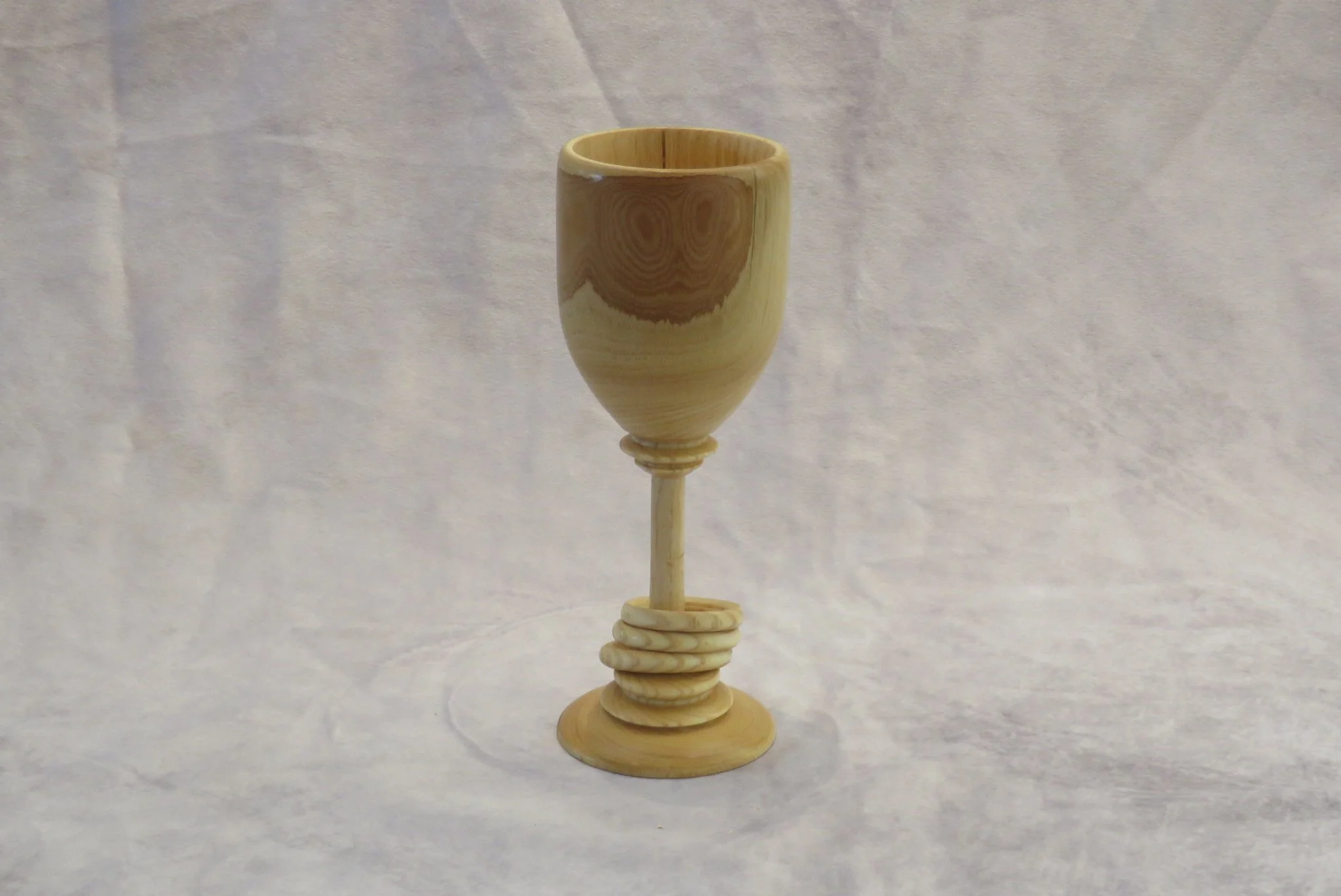 Ray Davis
Wine glass with captive rings-Ash