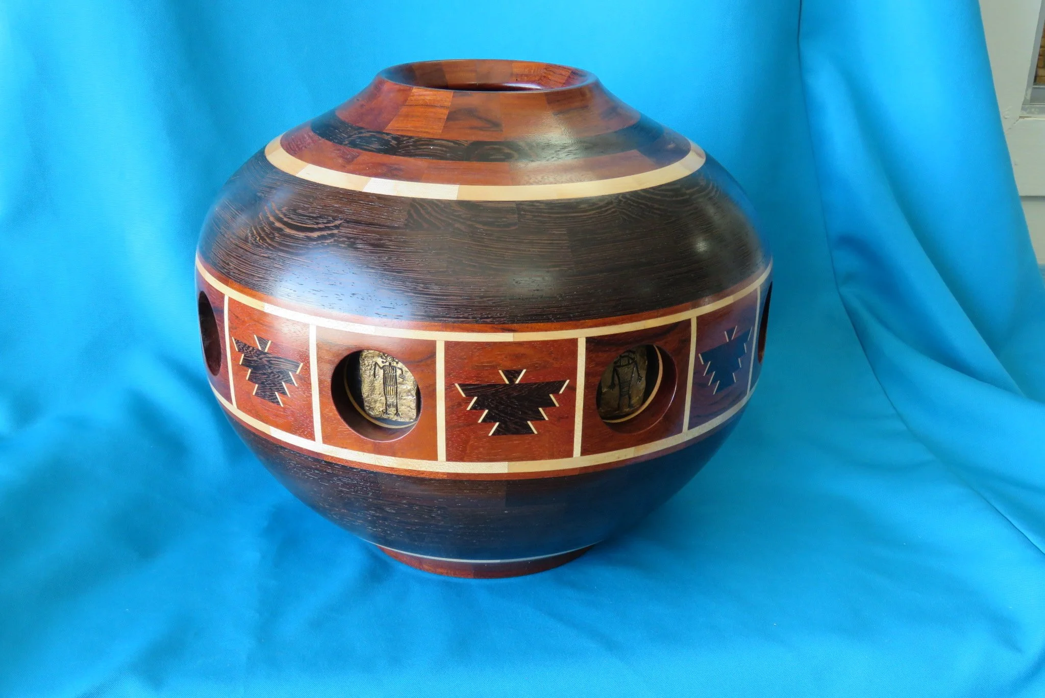Van Warren
Segmented pot with bronze.