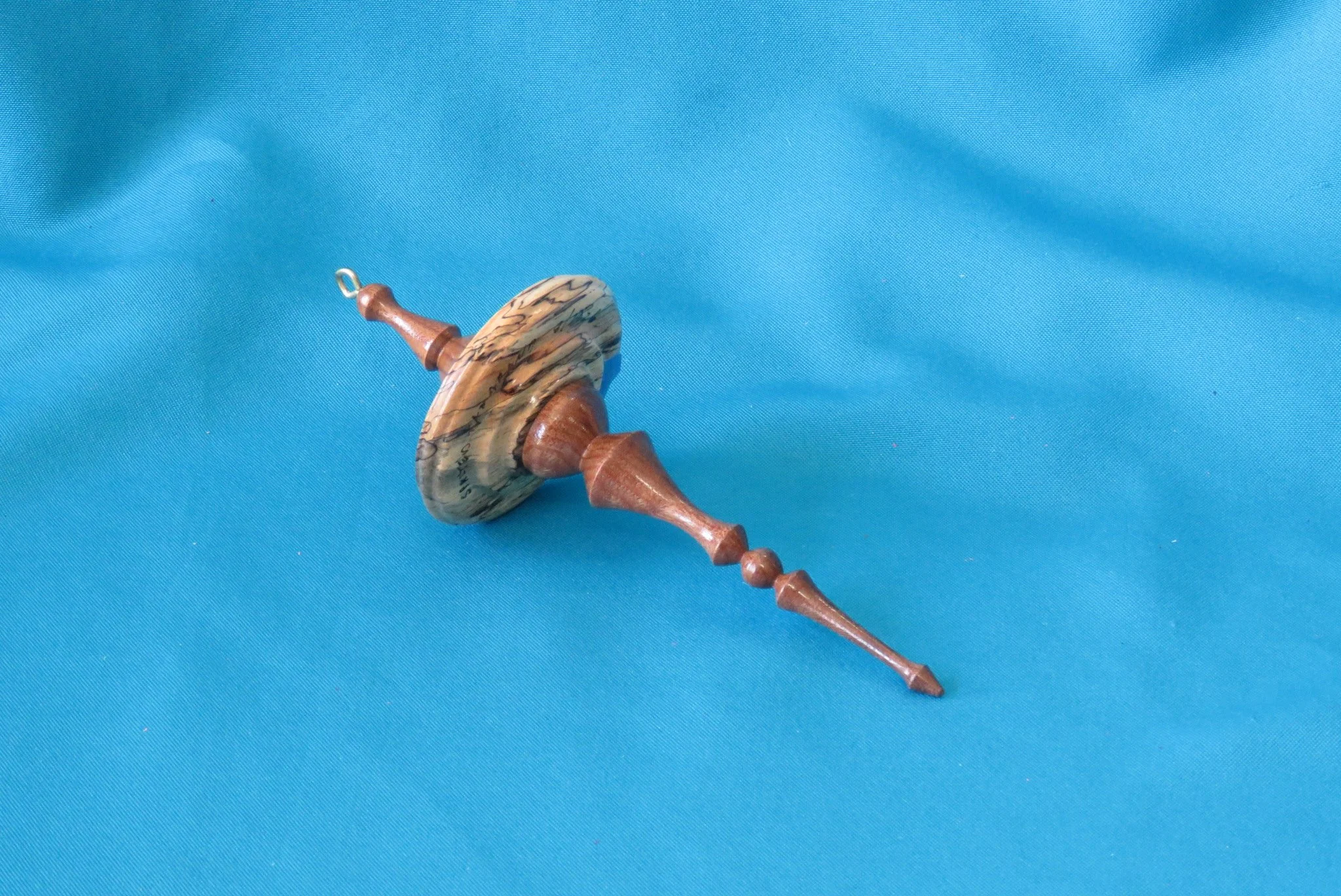 Jim Blakely
Christmas ornament-Spalted tamarind, black walnut, 1st
