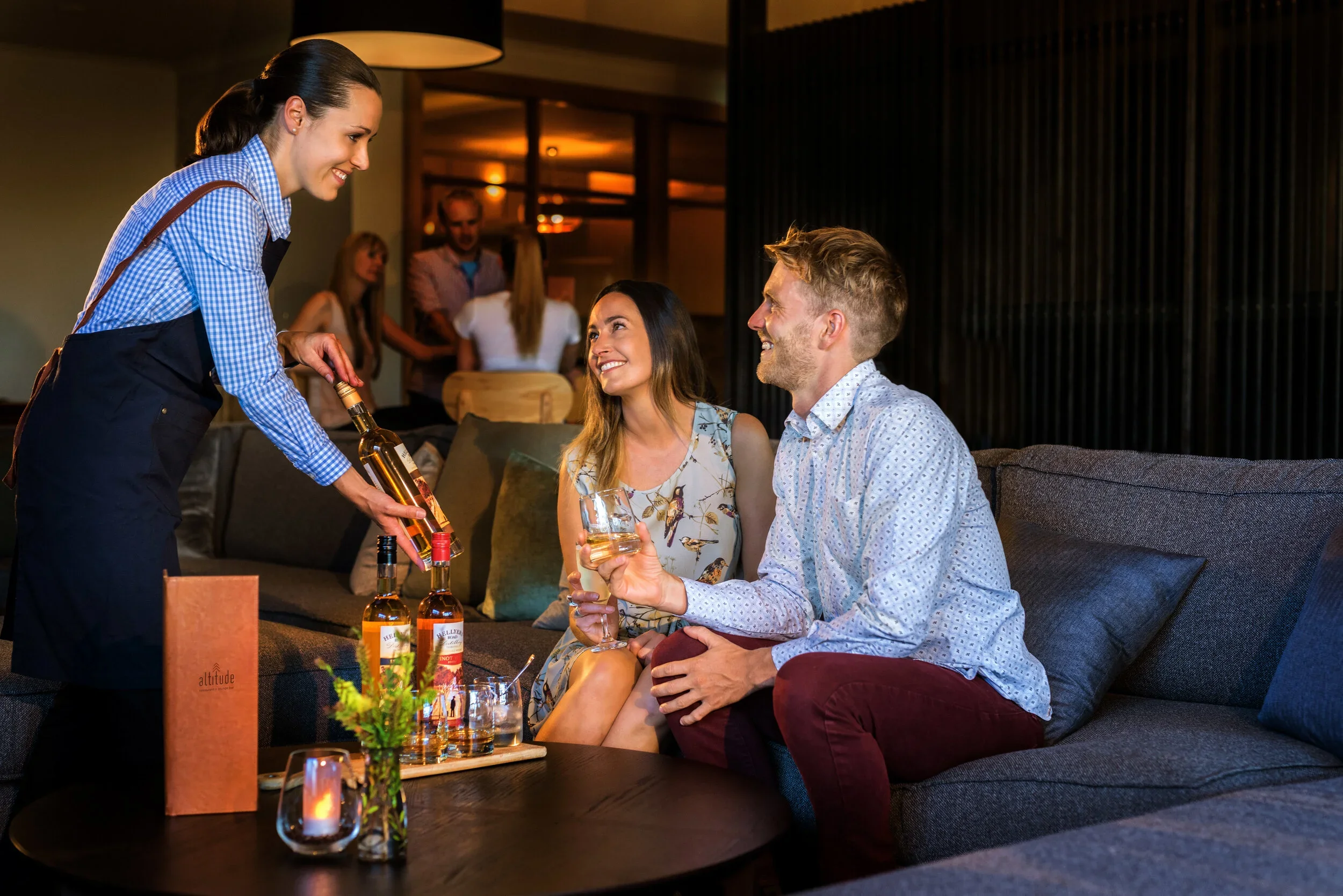 Cradle Mountain Attractions | Cradle Mountain Transfers | Couple being served by waitress