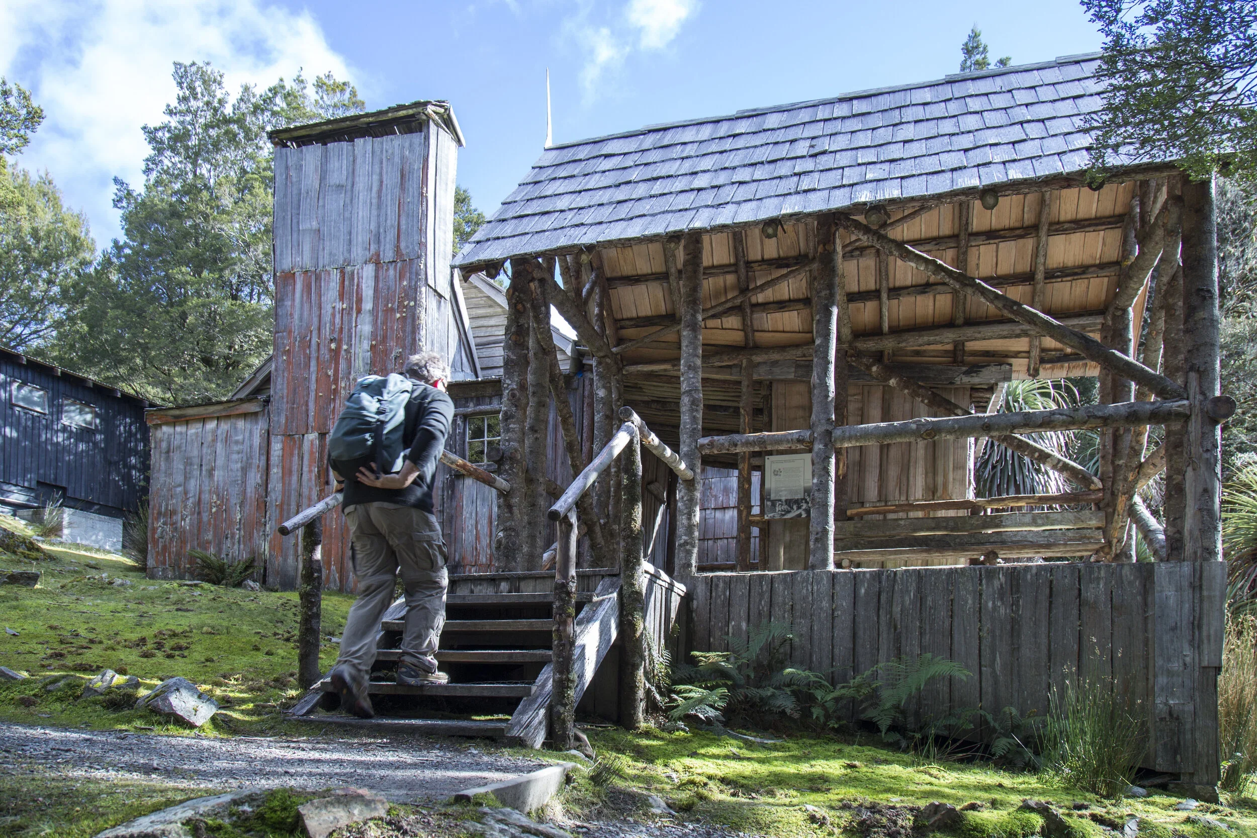 Cradle Mountain Attractions | Cradle Mountain Transfers | Man exploring Waldheim Chalet
