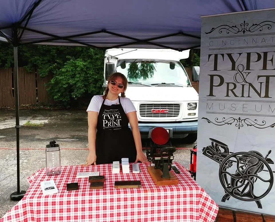 Lily at an outreach event for the Cincinnati Type & Print Museum