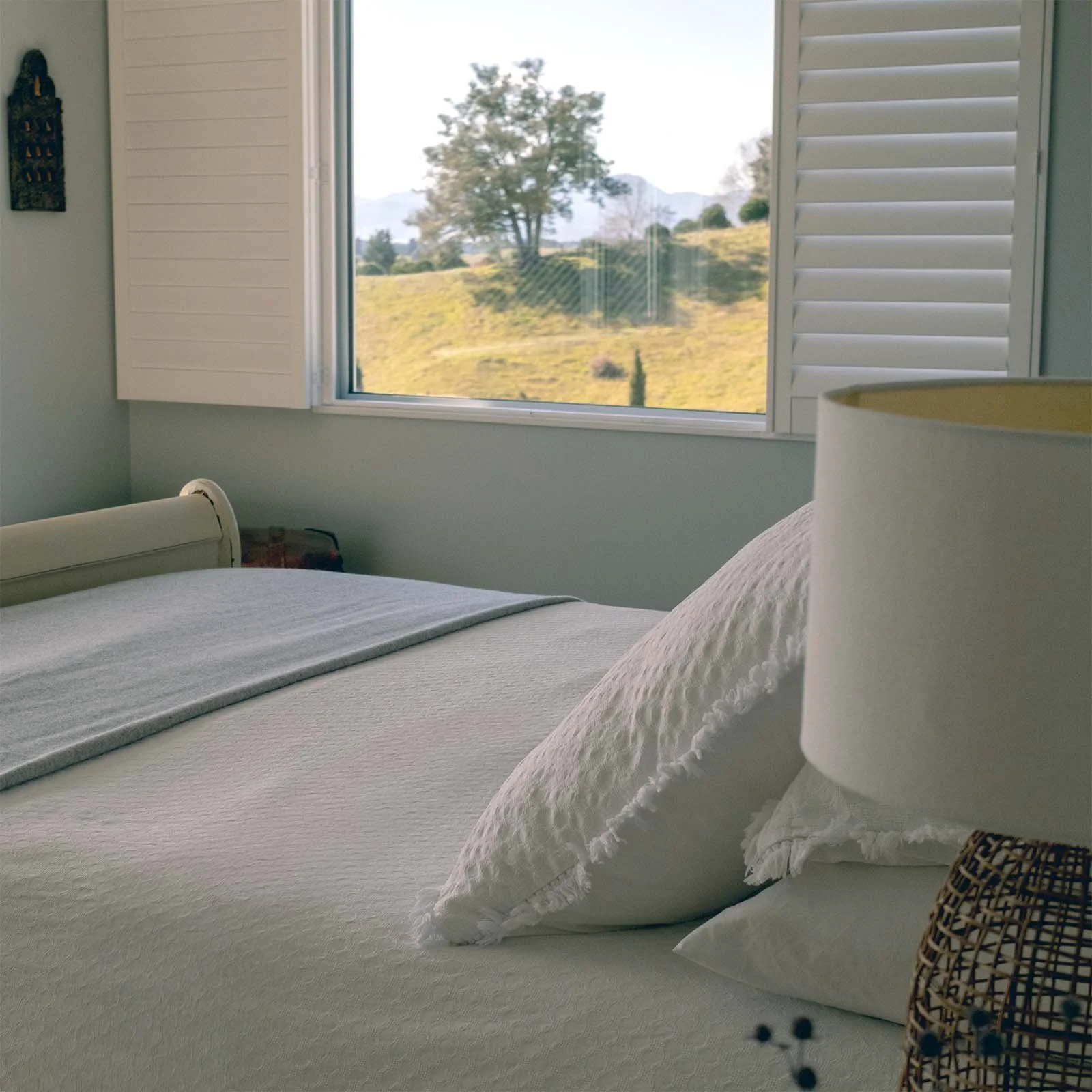 Enjoy the view over the valley from your bed.
