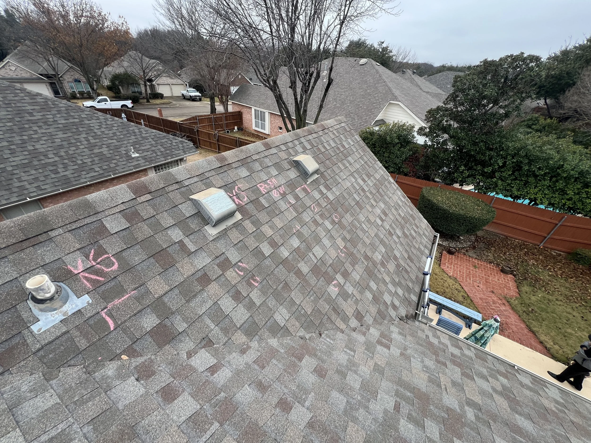 Hail and wind damage test square, hail damage to roof, wind damage to roof.
