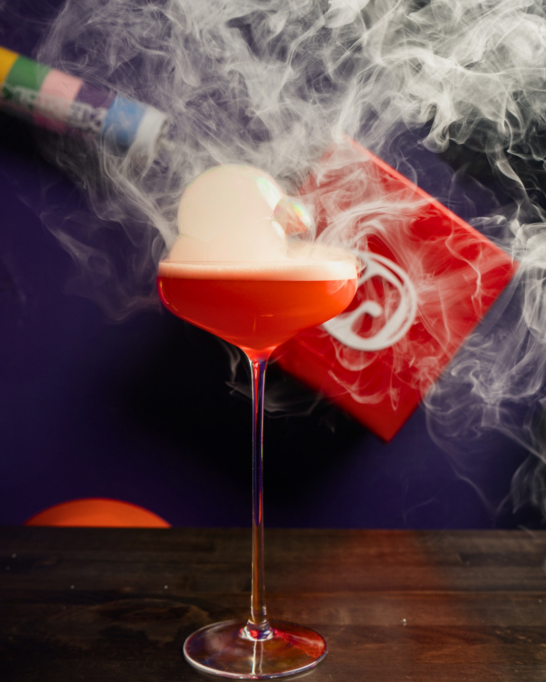 Flame Princess Paloma: hot tamale-infused 400 conejos mezcal, campari, grapefruit, salted cinnamon marzipan orgeat, grapefruit vapor bubbles
