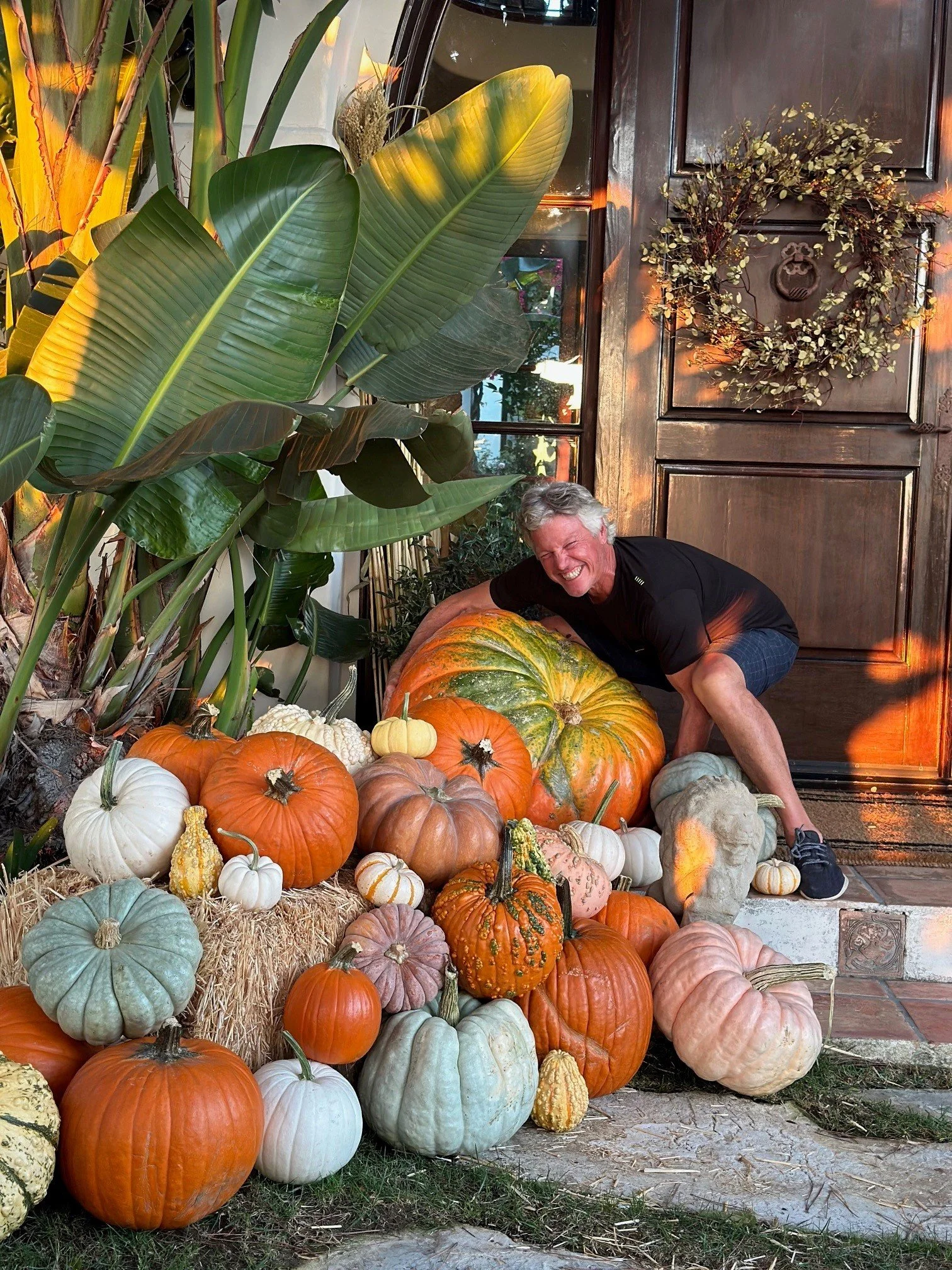 Los Angeles based client posing with grand prize pumpkin
