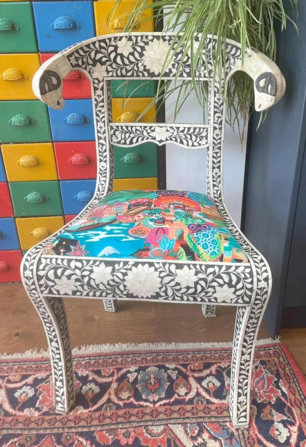 Antique bone inlay chair reupholstered in vibrant fabric