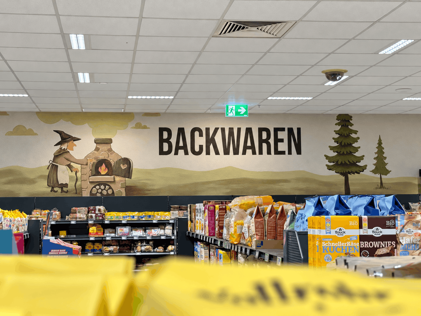 Supermarkt-Bäckerei mit Wandgemälde.png