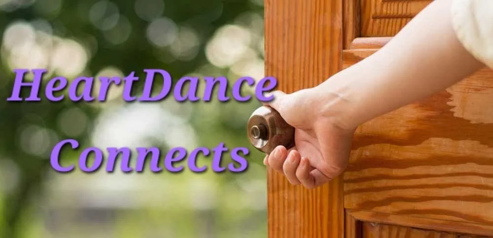 A person's hand opening a wooden door with a doorknob, with the text 'HeartDance Connects' overlaid on the image.