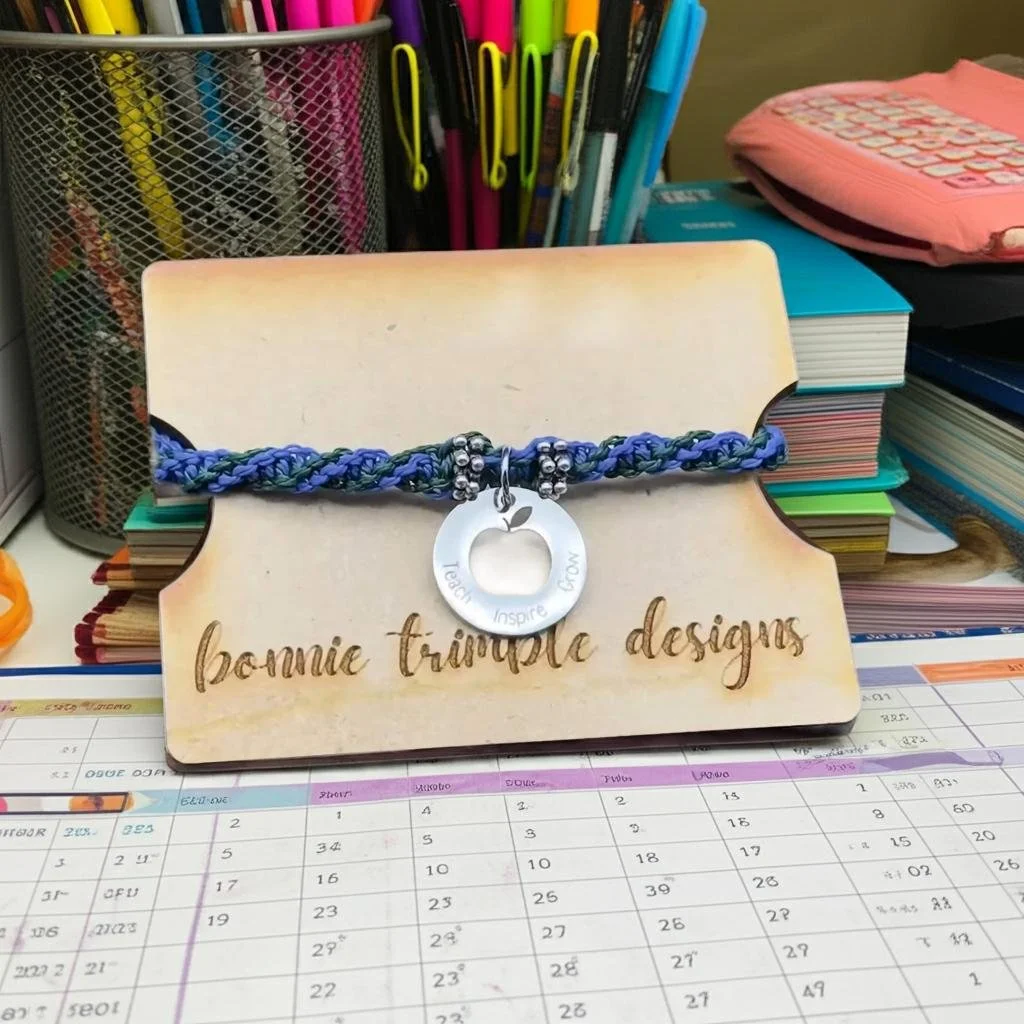 close-up of the practical mentor bracelet highlighting the precise micro-macramé knots and the polished metal charm.