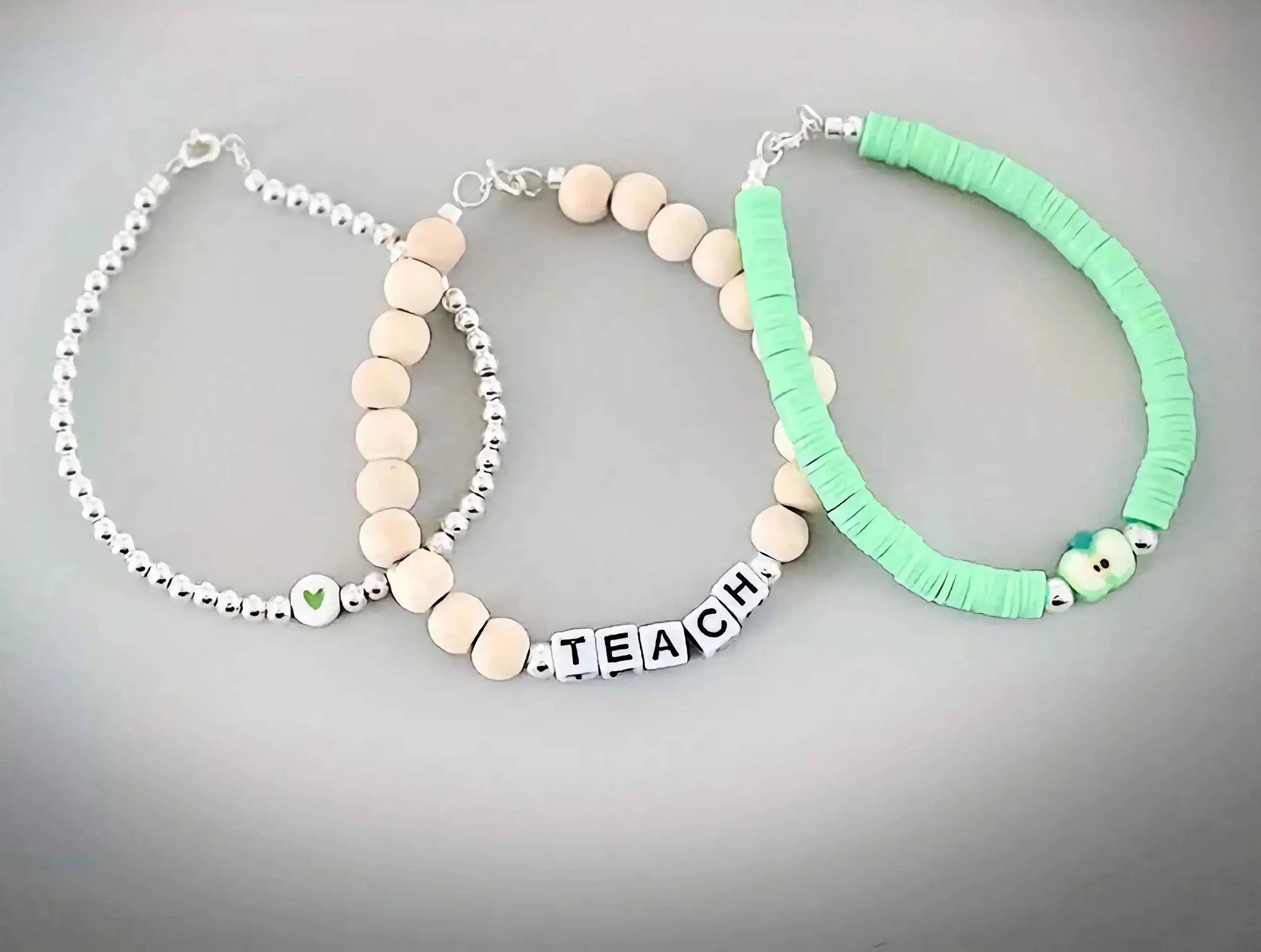 minimalist teacher jewelry stack in 3mm sterling silver designed for a subtle and professional school-day look.